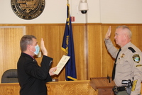 Sheriff Hanlin takes his oath of office administered by County Clerk Dan Loomis