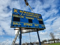 McMahon sign being installed Wednesday, March 13