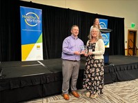 Adrean Myers, KSD Wellness Committee member, receives Zo8 Award