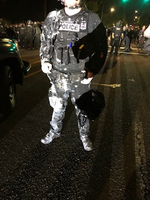Officer Covered in Paint