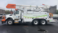 Photo of a bucket truck currently in PGE's fleet that uses electricity to run the lift and heat and cool the cab.