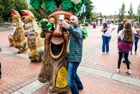 Vancouver City Council Member, Ty Stober, pauses to snap a selfie with Friends of Trees' mascot Gary Oak in 2019. Selfies will be even more important as all aspects of the giving day move online this year.