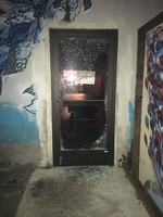 shattered glass door