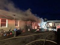 Firefighters make entry for fire attack