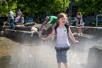 Children playing in the Esther Short Park Water Feature in Vancouver, Washington