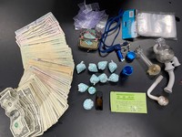Fentanyl pills, drug paraphernalia and $2,400 cash recovered during traffic stop.