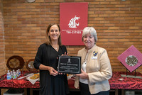WSU Tri-Cities Chancellor, Sandra Haynes (left) and current Past-President Soroptimist International of Three Rivers, Mary Dover (right) hold the dedication plaque for the WSU Tri-Cities women's wellness lounge donated by Soroptimist International of Thre