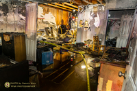 Fire Damage Interior and Investigators Working