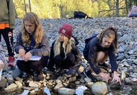 (L to R) Ruby Stenbak, Jane Murri, Sophie Lanham collect water samples as part of a science lesson