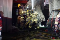 Firefighters Extinguishing Hotspots