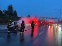 Car fire on I5.  Engine1 and Truck1 in background.