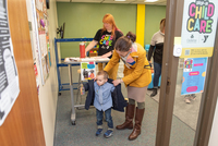 A Clackamas Community College student drops a child off at the new drop-in child care center on the college's Oregon City campus.