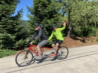 NWABA athlete and guide on a tandem bike.